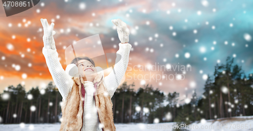 Image of happy little girl enjoying winter and snow