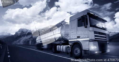 Image of truck driving at dusk/motion blur