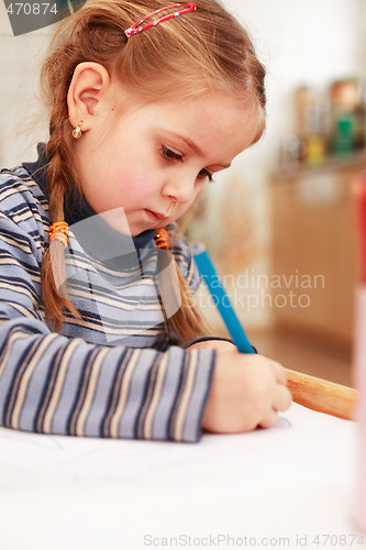 Image of Cute little girl painting
