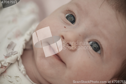 Image of happy newborn little baby smilling