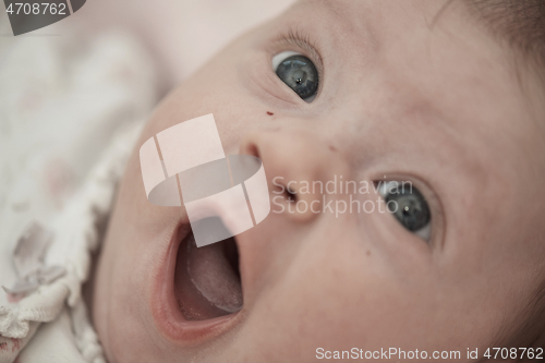 Image of happy newborn little baby smilling