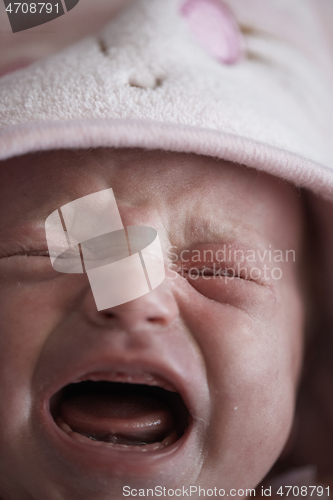 Image of newborn baby crying and screaming