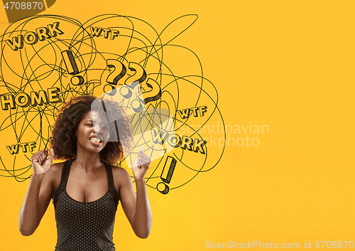 Image of Young african-american woman with mixed thoughts