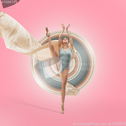 Image of Ballerina. Young graceful female ballet dancer dancing over pink studio. Beauty of classic ballet.