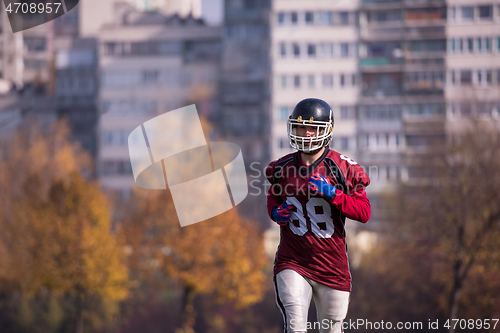 Image of american football player in action