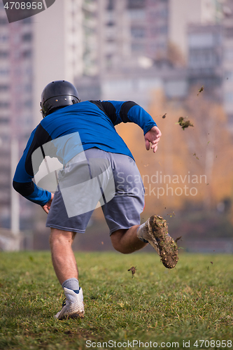 Image of american football player in action