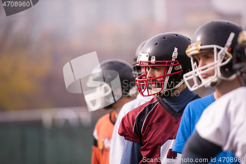 Image of portrait of young american football team