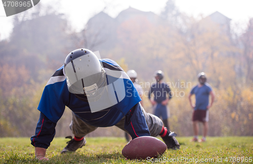 Image of american football player in action