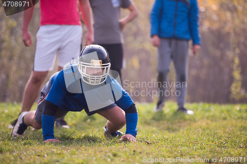 Image of american football player in action