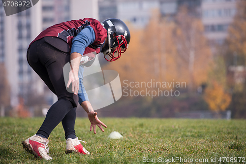 Image of american football player in action