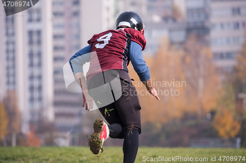 Image of american football player in action