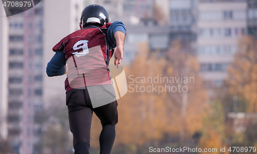 Image of american football player in action