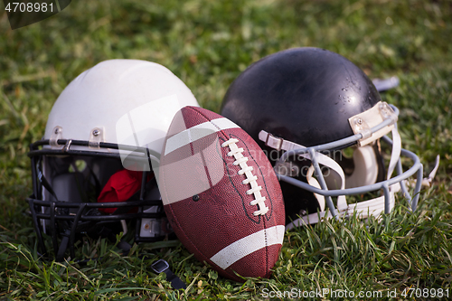 Image of American football helmets and ball