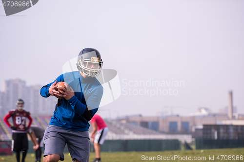 Image of american football team in action