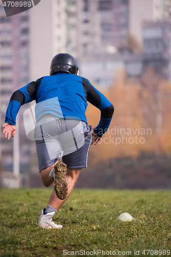 Image of american football player in action