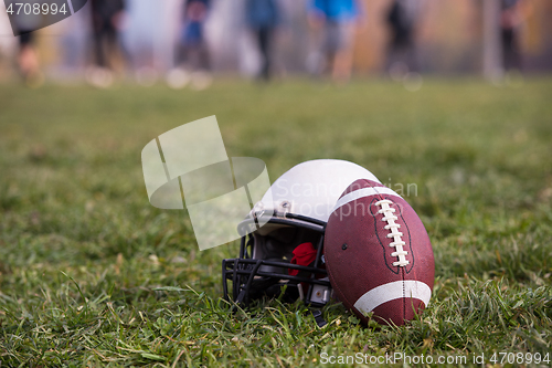 Image of American football helmet and ball