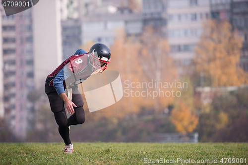 Image of american football player in action