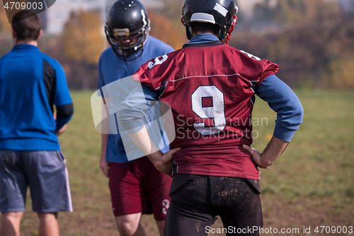 Image of american football team in action