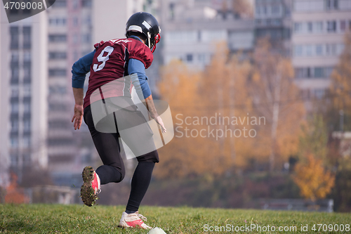 Image of american football player in action