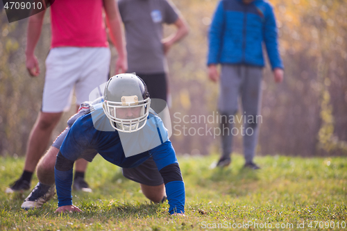 Image of american football player in action