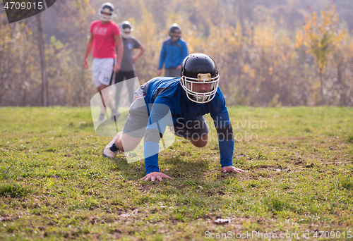 Image of american football player in action