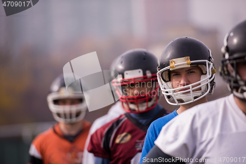 Image of portrait of young american football team