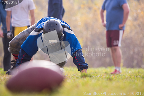 Image of american football player in action