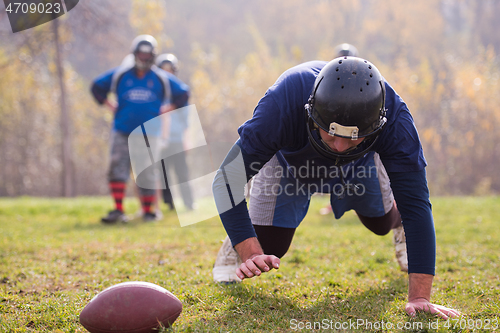 Image of american football player in action