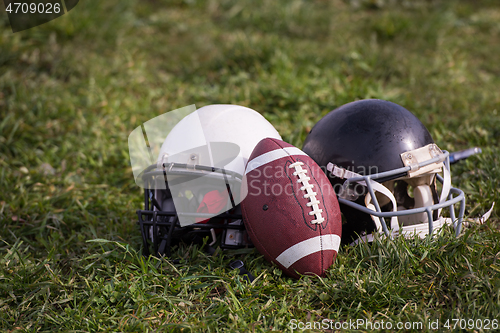 Image of American football helmets and ball