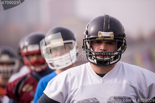 Image of portrait of young american football team