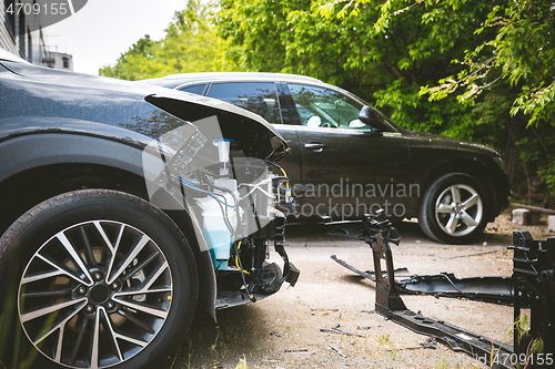 Image of Broken and crashed modern car after an accident on street