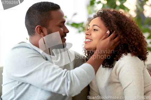 Image of happy african american couple at home