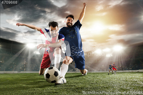 Image of Football or soccer players colored in United Kingdom and European Unity flags