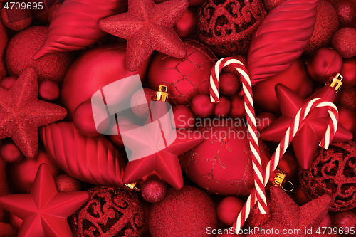 Image of Candy Cane and Red Bauble Christmas Background