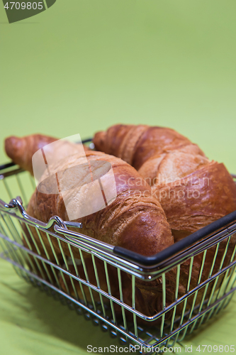 Image of Macro shoot of croissants in shopping basket