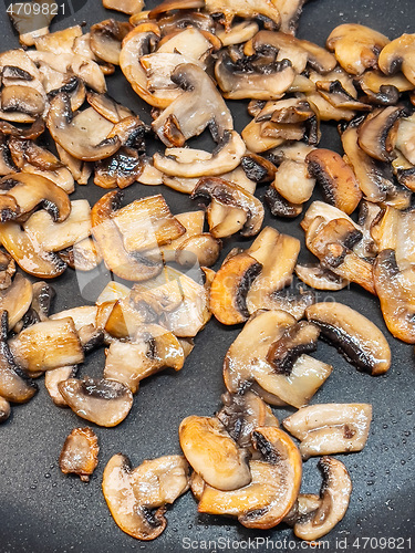 Image of Fried mushrooms in pan