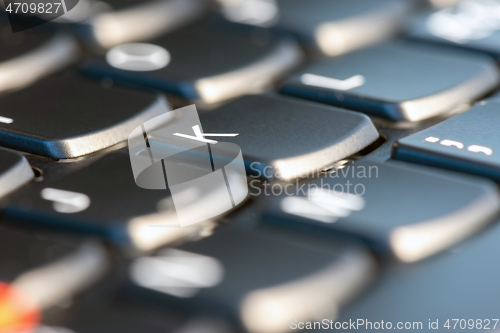 Image of Macro shot of black keyboard focus on K key