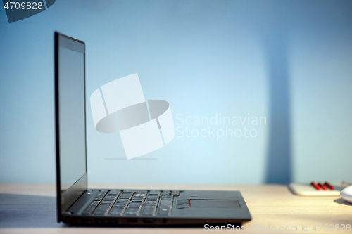 Image of Side view to the slim laptop