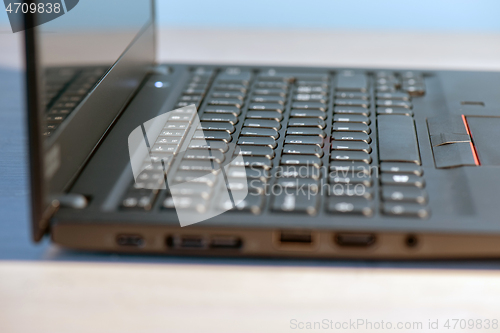 Image of Macro shot of laptop with black keyboard
