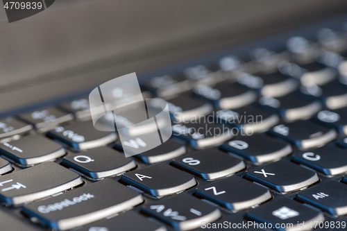 Image of Macro shot of laptop with black keyboard