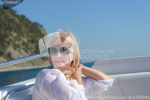 Image of Blonde in a sunglasses