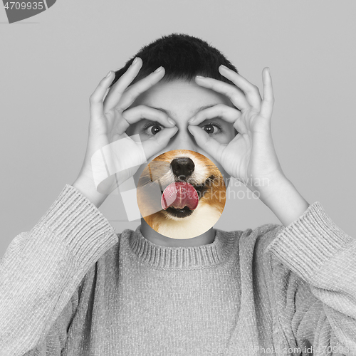 Image of Contemporary artwork collage concept. Portrait of woman with pet\'s tongue sticked out, bw style