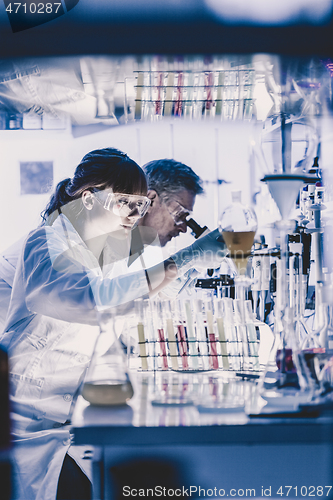 Image of Health care researchers working in scientific laboratory.