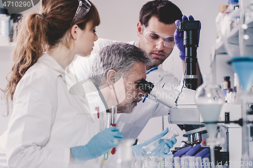 Image of Health care researchers working in scientific laboratory.