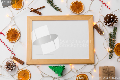 Image of white board, garland and christmas decorations