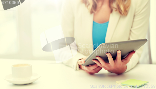 Image of close up of businesswoman with tablet pc