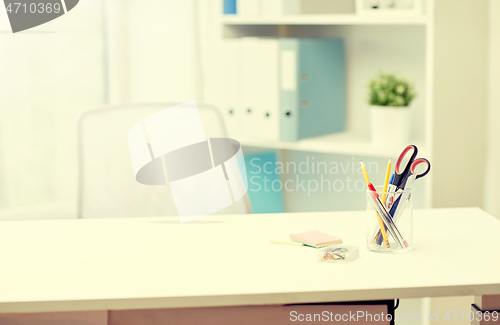 Image of stationery on table in office interior