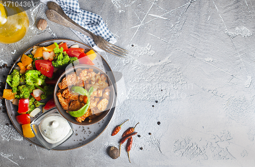 Image of chicken with vegetables