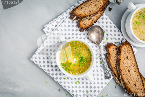 Image of Homemade egg soup with fresh sourdough bread