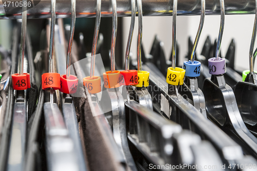 Image of Hangers in a Clothes Shop